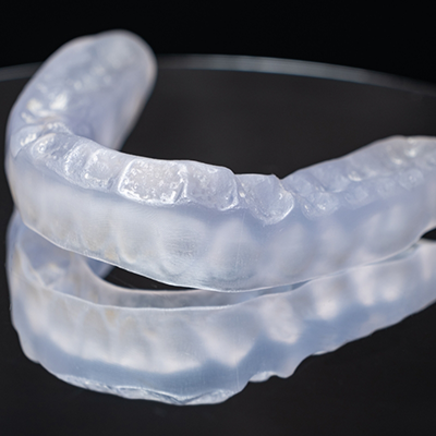 Close-up of occlusal splint on reflective surface
