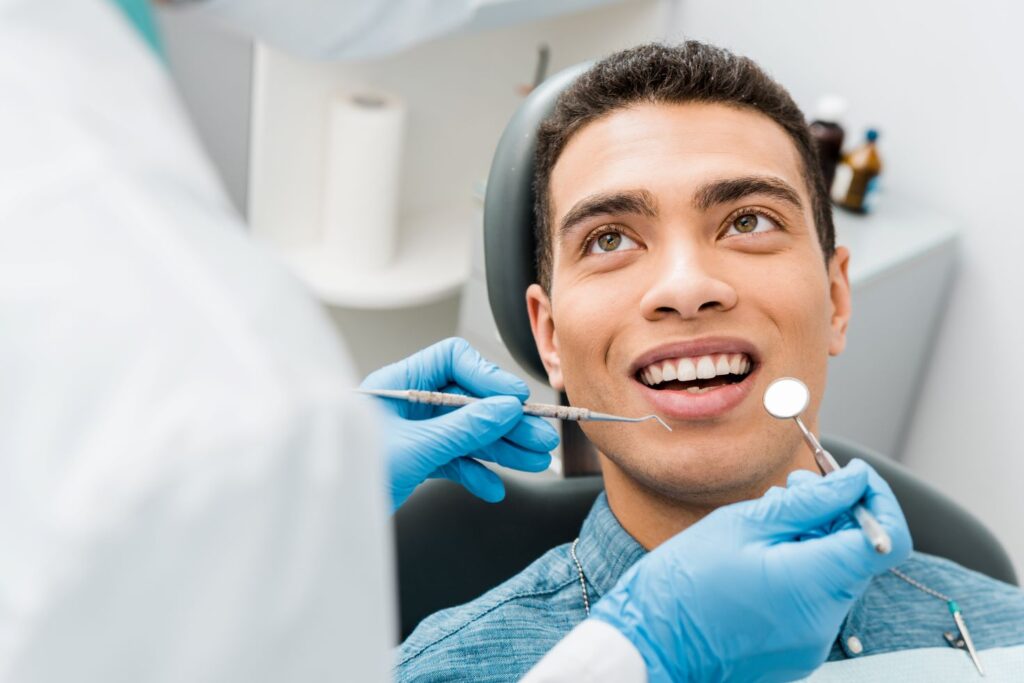 A young man in a dental chair